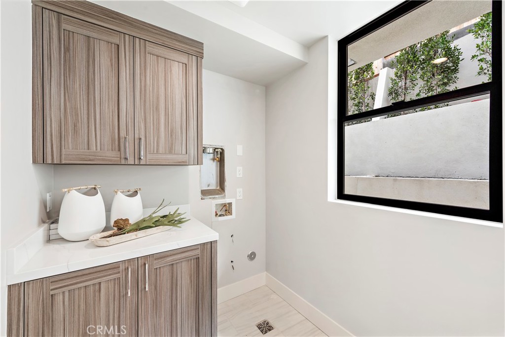 33889 Robles Drive Dana Point, CA 92629 - Photo 20 of 42 a bathroom with a sink and a window