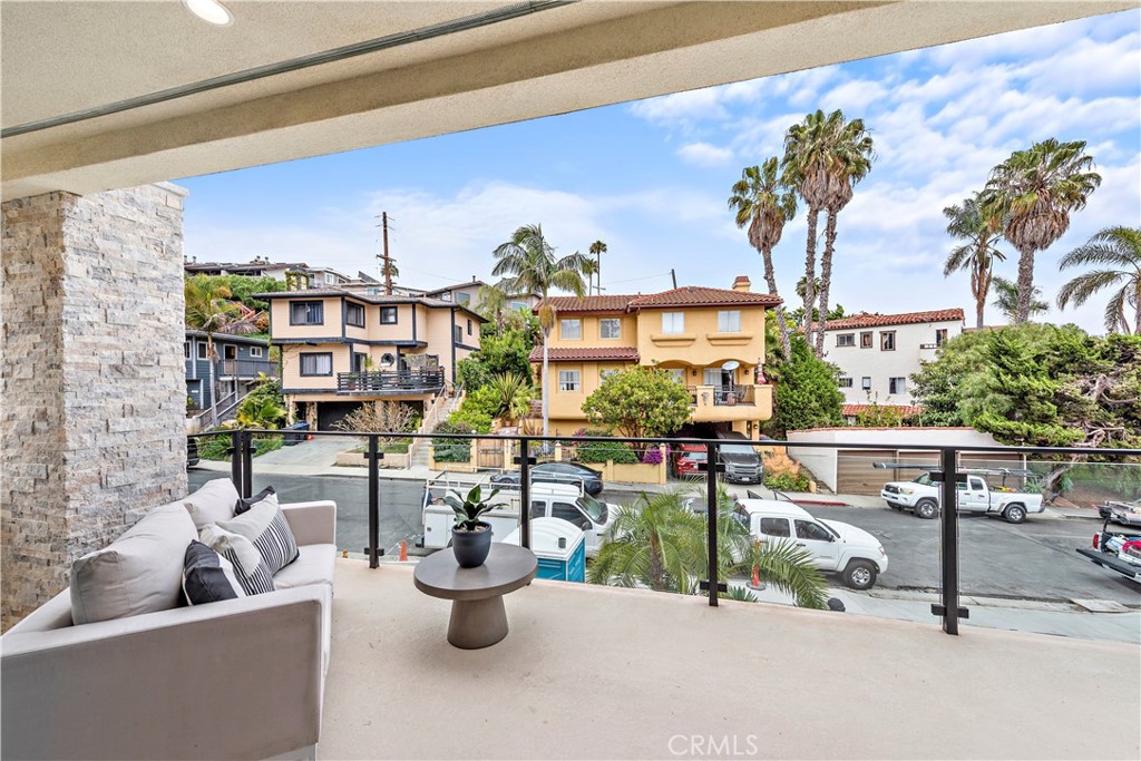 33889 Robles Drive Dana Point, CA 92629 - Photo 22 of 42 a view of a chairs and table in patio