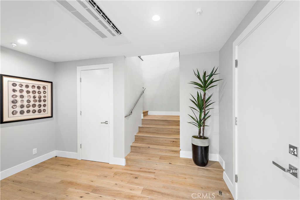 33889 Robles Drive Dana Point, CA 92629 - Photo 3 of 42 a view of entryway with stairs and wooden floor