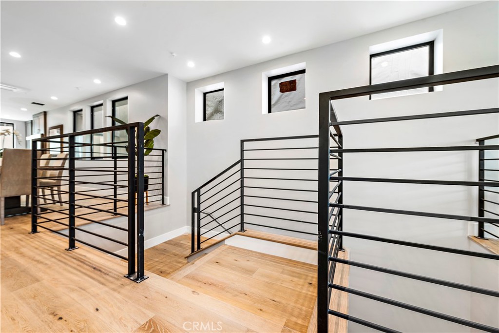 33889 Robles Drive Dana Point, CA 92629 - Photo 39 of 42 a view of a hallway with stairs