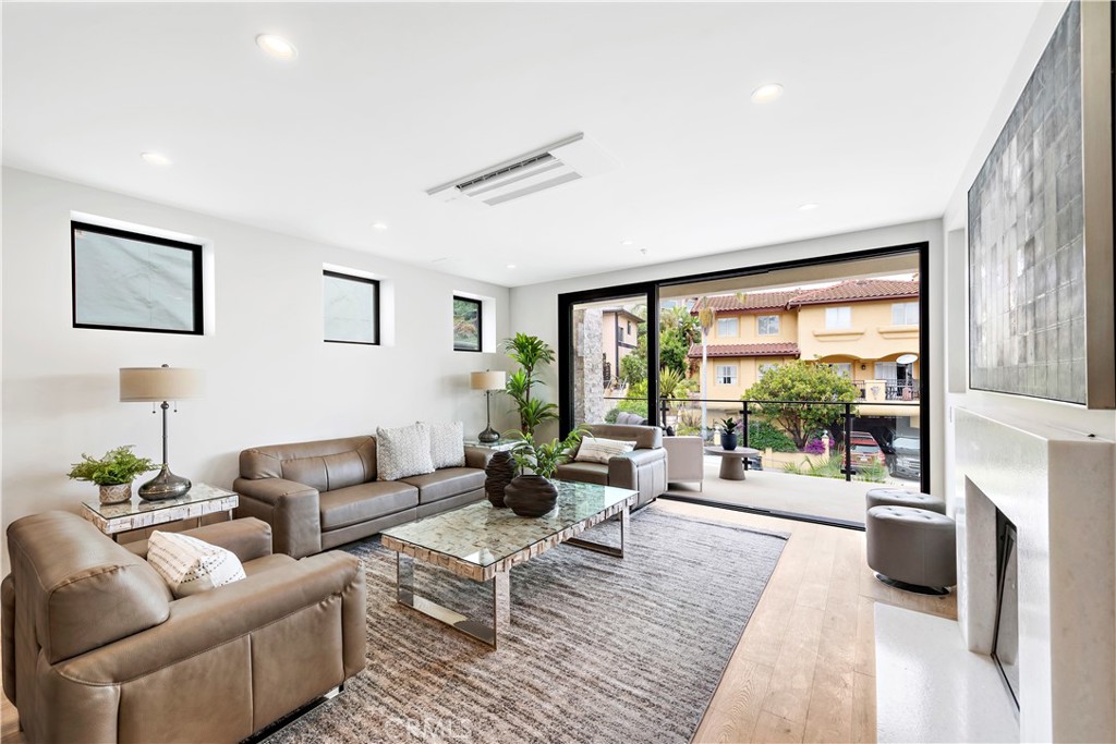33889 Robles Drive Dana Point, CA 92629 - Photo 5 of 42 a living room with furniture and a large window