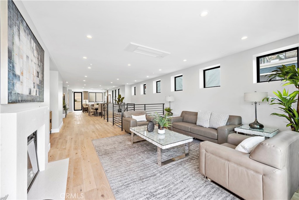 33889 Robles Drive Dana Point, CA 92629 - Photo 6 of 42 a living room with furniture and a wooden floor