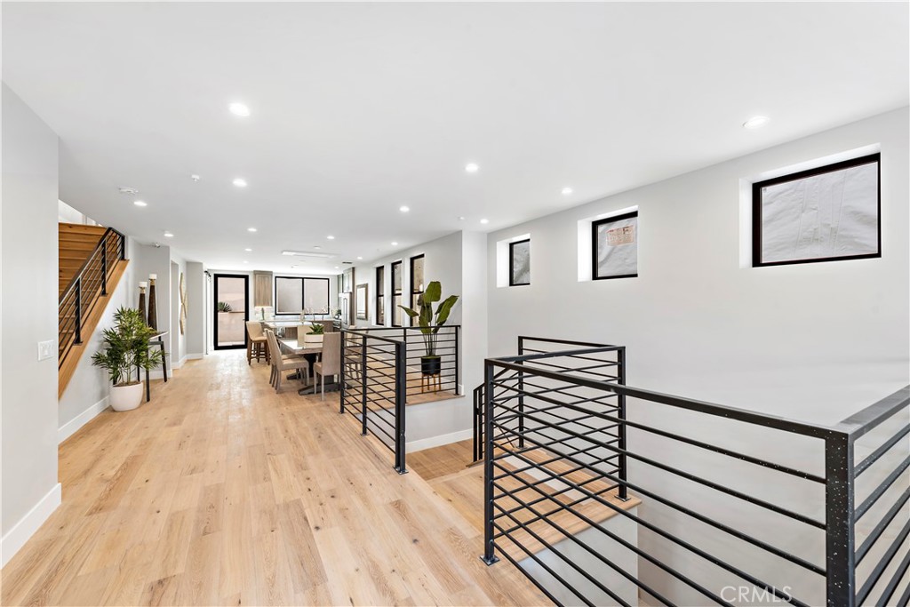 33889 Robles Drive Dana Point, CA 92629 - Photo 7 of 42 a living room with furniture and wooden floor