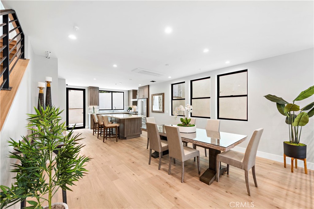 33889 Robles Drive Dana Point, CA 92629 - Photo 10 of 42 a view of a dining room with furniture and a potted plant