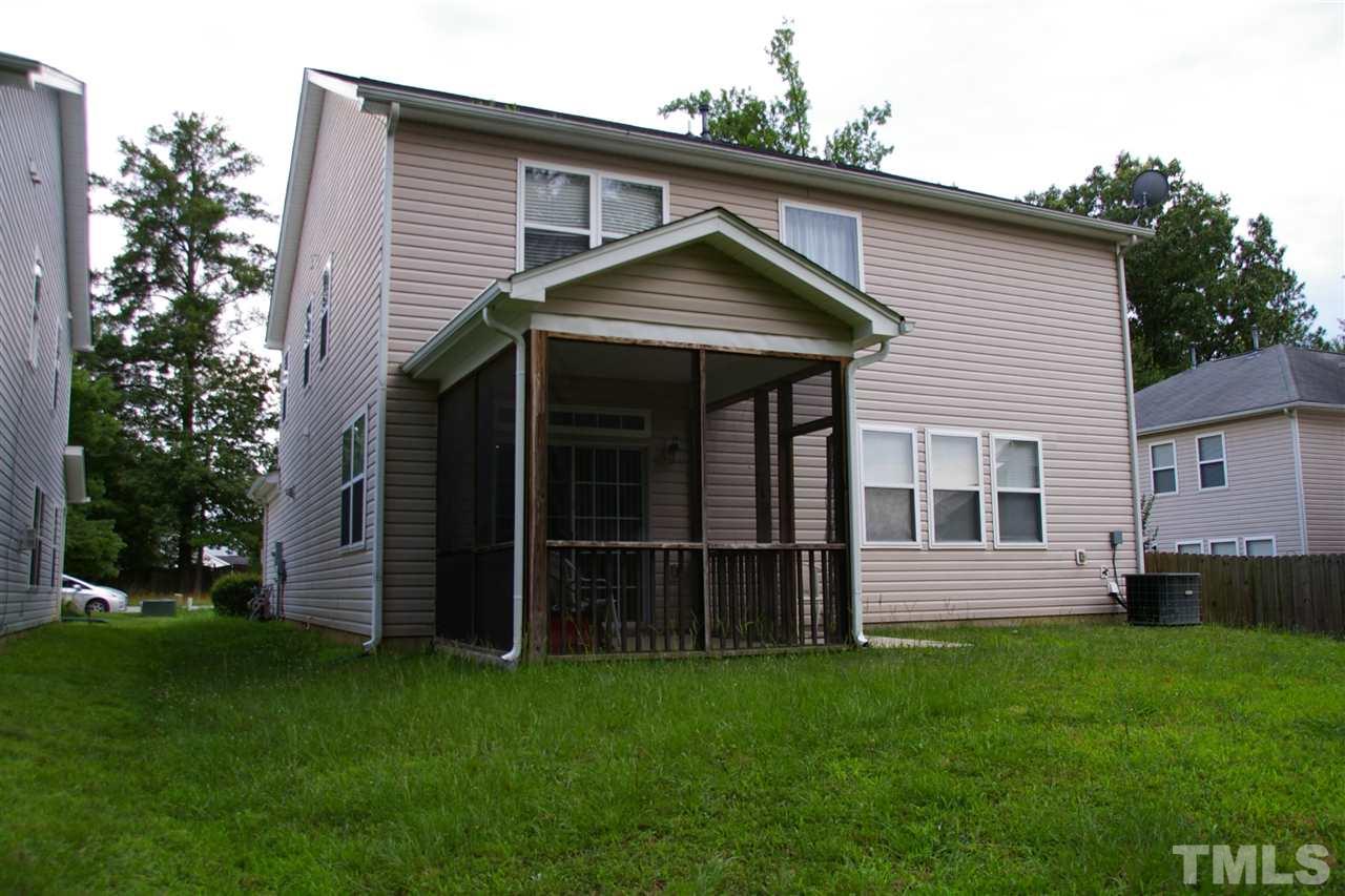 5245 Thornton Road Raleigh, NC 27616 - Photo 2 of 9 a front view of a house with a garden