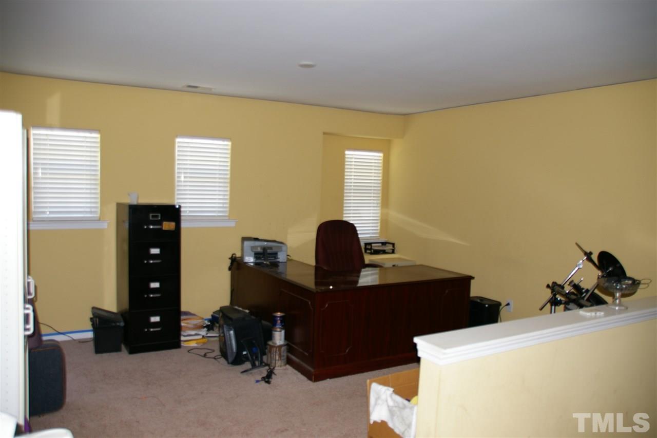 5245 Thornton Road Raleigh, NC 27616 - Photo 9 of 9 a view of a workspace with furniture
