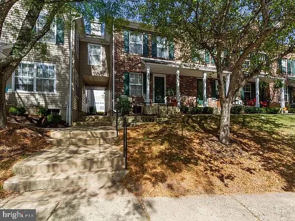 front view of a building with a yard