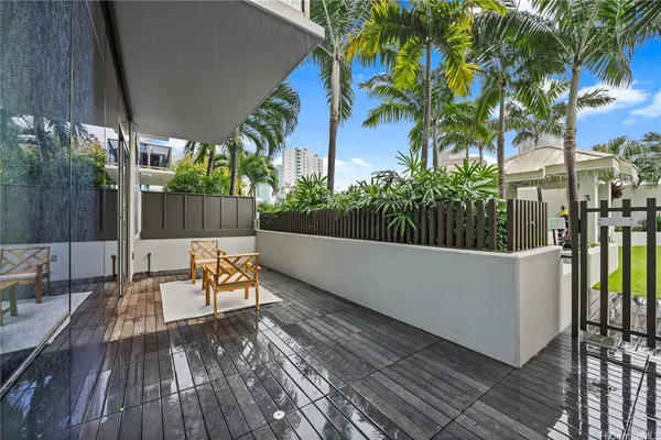 swimming pool with outdoor seating and yard
