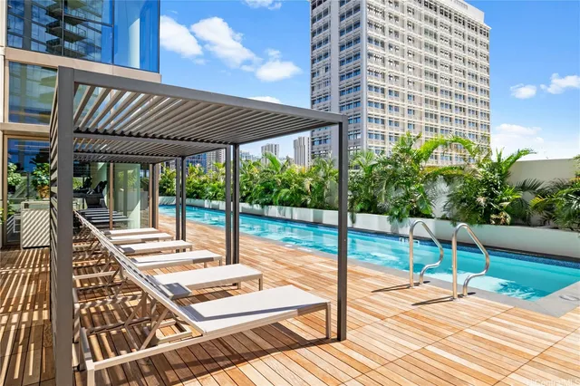 a view of a balcony with wooden floor and pool table