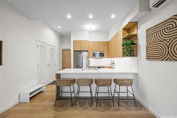 a view of a dining room with furniture