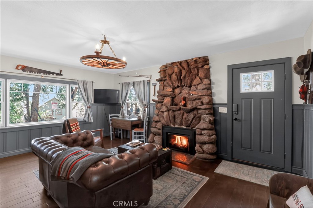 2775 View Running Springs, CA 92382 - Photo 13 of 30 a living room with furniture a flat screen tv and a window