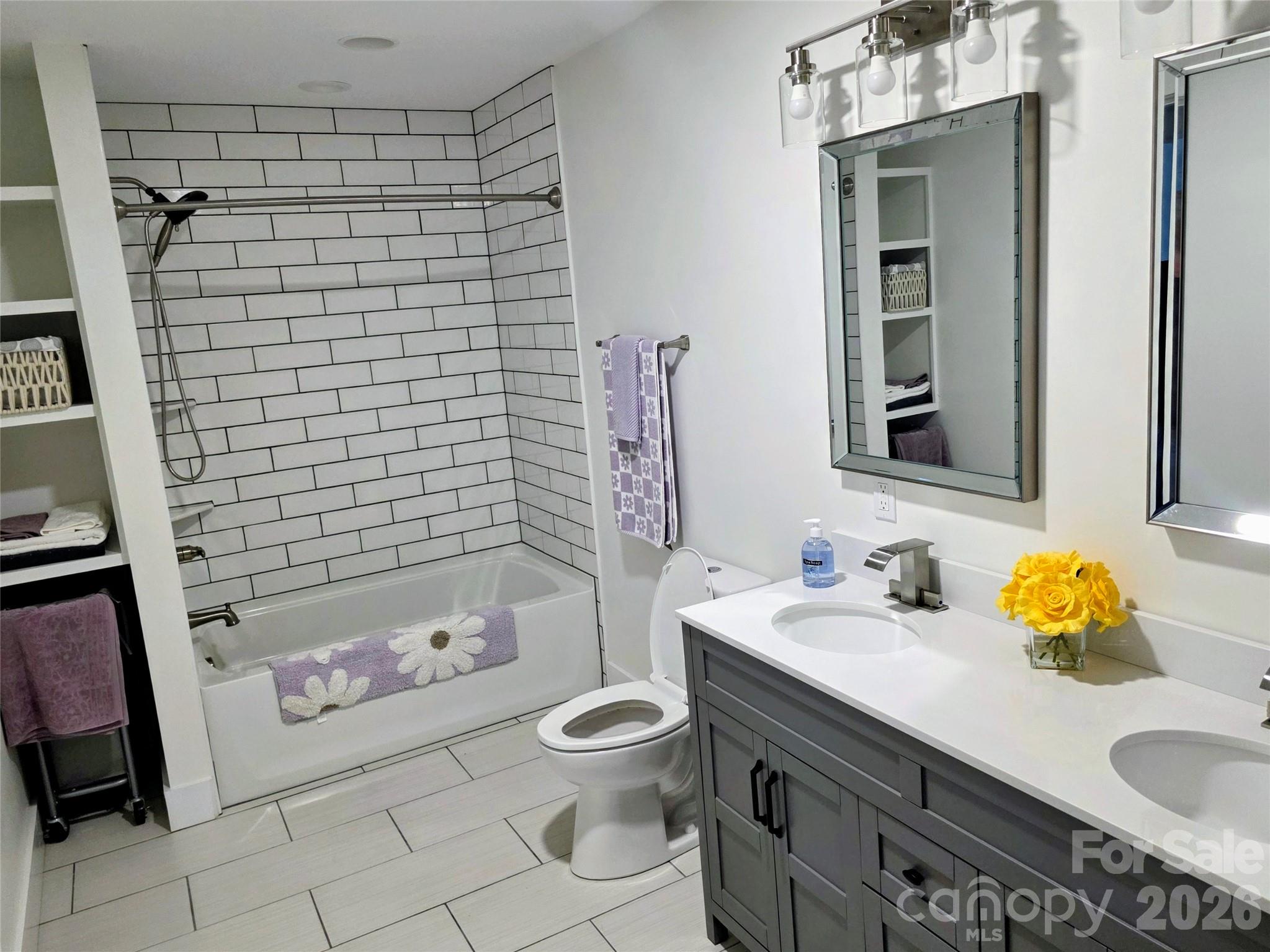 24 Salt Burnsville, NC 28714 - Photo 24 of 42 a bathroom with a sink toilet and shower