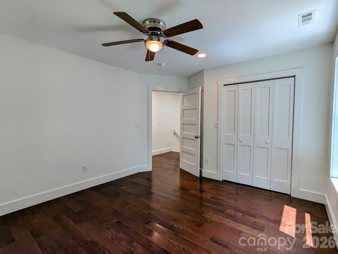 24 Salt Burnsville, NC 28714 - Photo 29 of 42 a view of an empty room with wooden floor