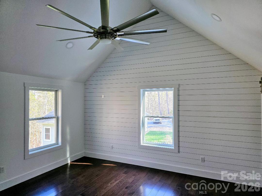24 Salt Burnsville, NC 28714 - Photo 30 of 42 a view of an empty room with wooden floor and a window