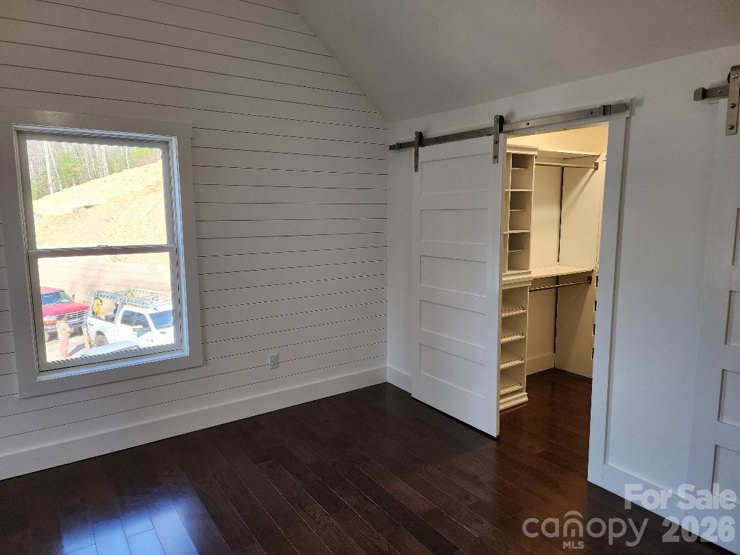 24 Salt Burnsville, NC 28714 - Photo 32 of 42 a view of an empty room with wooden floor and a window