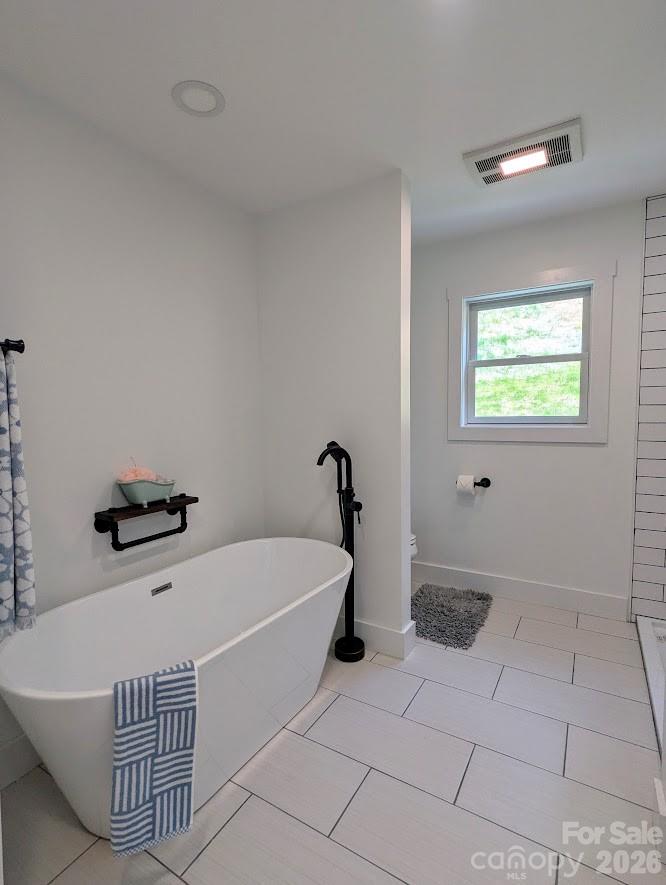 24 Salt Burnsville, NC 28714 - Photo 40 of 42 a white bath tub sitting in a bathroom