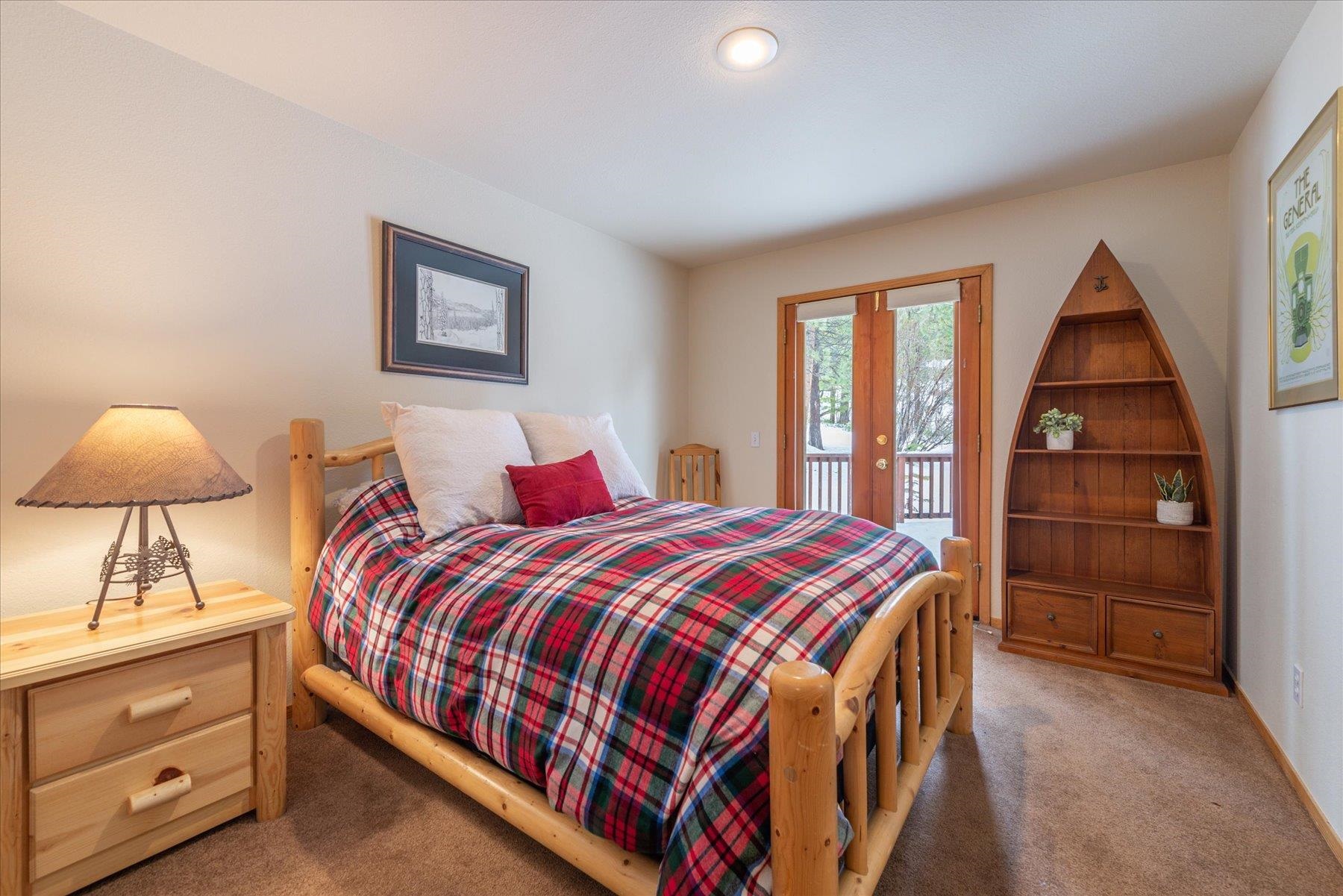 14236 Wolfgang Road Truckee, CA 96161 - Photo 11 of 21 a bedroom with a bed and a closet
