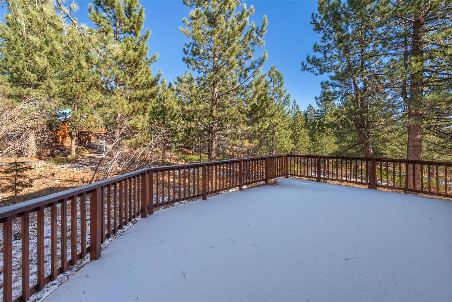 14236 Wolfgang Road Truckee, CA 96161 - Photo 16 of 21 a view of balcony with floor to ceiling window and wooden fence