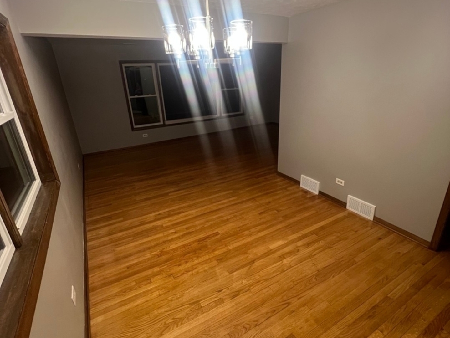 1235 South Mannheim Road, Unit 3 Westchester, IL 60154 - Photo 4 of 7 a view of a room with wooden floor and staircase