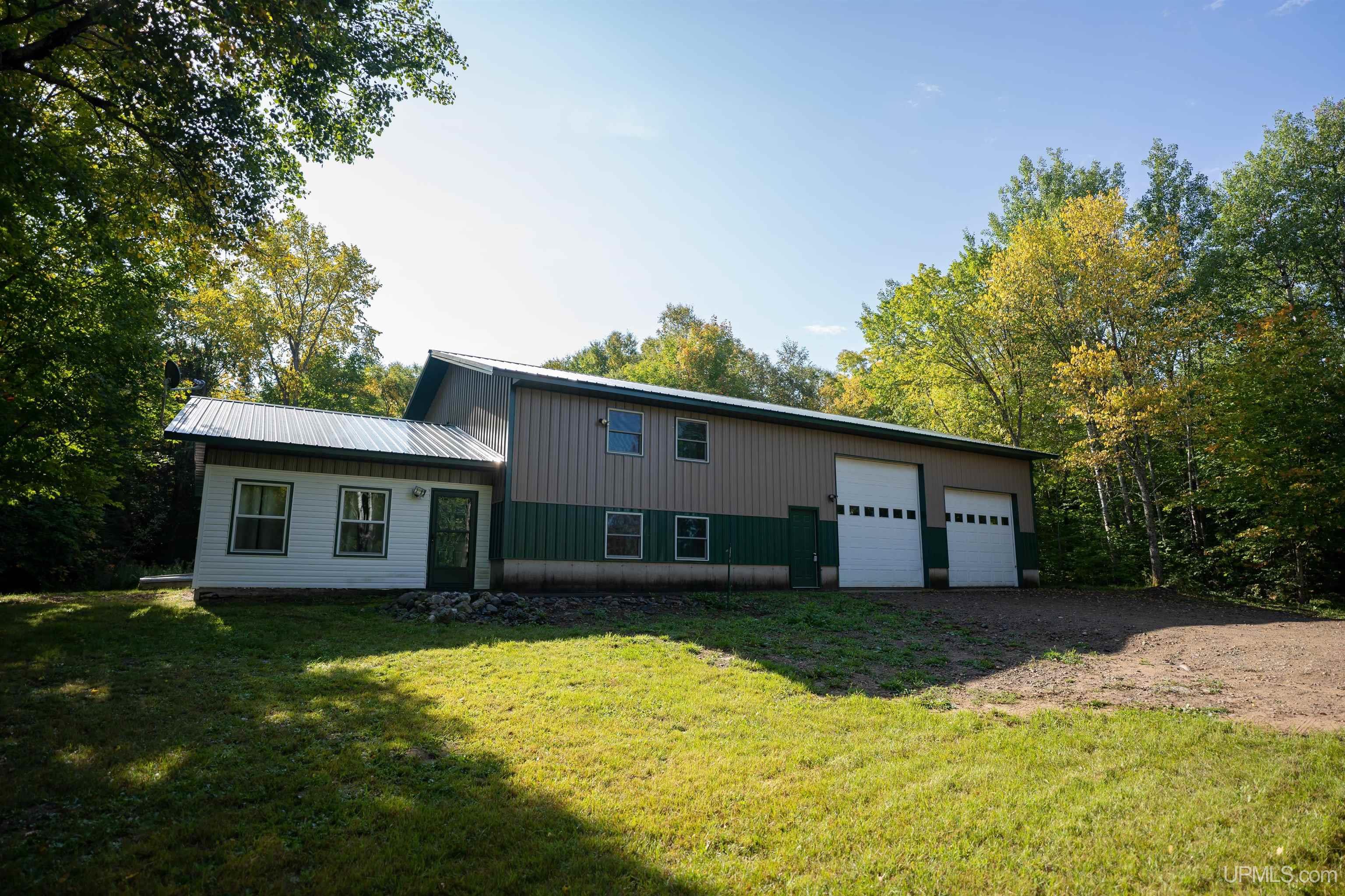6766 Co Road, Unit ALSO KNOWN AS BLACKHILL S Champion, MI 49814 - Photo 1 of 80