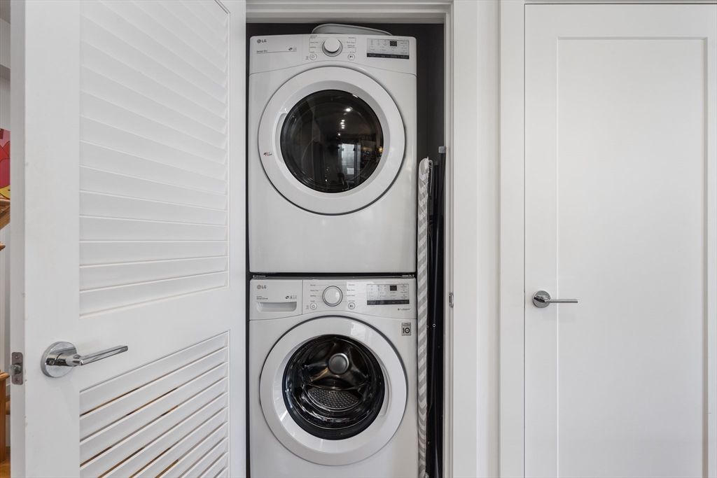 49 Rogers Street, Unit 7 Boston, MA 02127 - Photo 8 of 11 a utility room with dryer and washer
