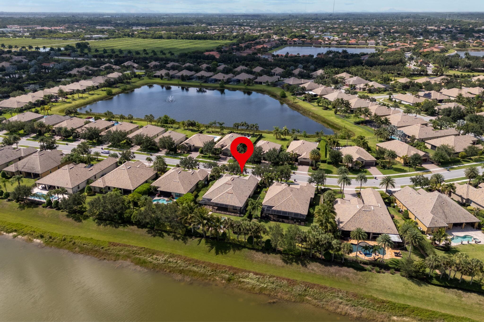 10765 Pisa Road Wellington, FL 33414 - Photo 55 of 61 Pisa Road back lake