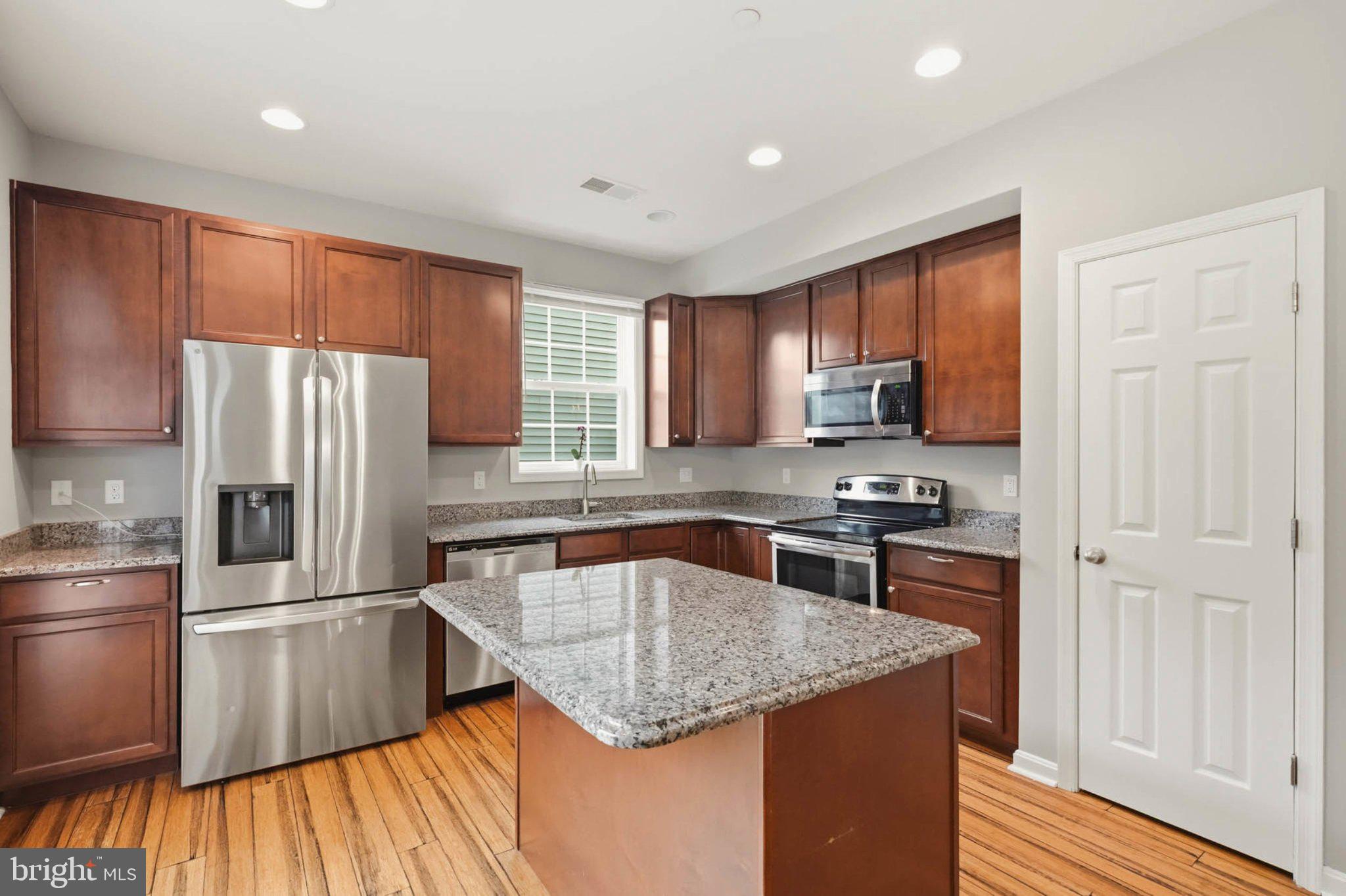 706 Trapper Way Deale, MD 20751 - Photo 19 of 61 Modern kitchen with sleek finishes.