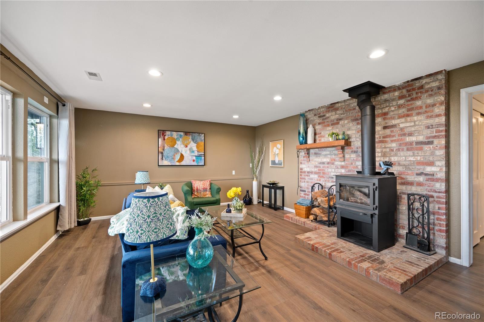 11740 Baca Road Conifer, CO 80433 - Photo 12 of 49 a living room with furniture and wooden floor