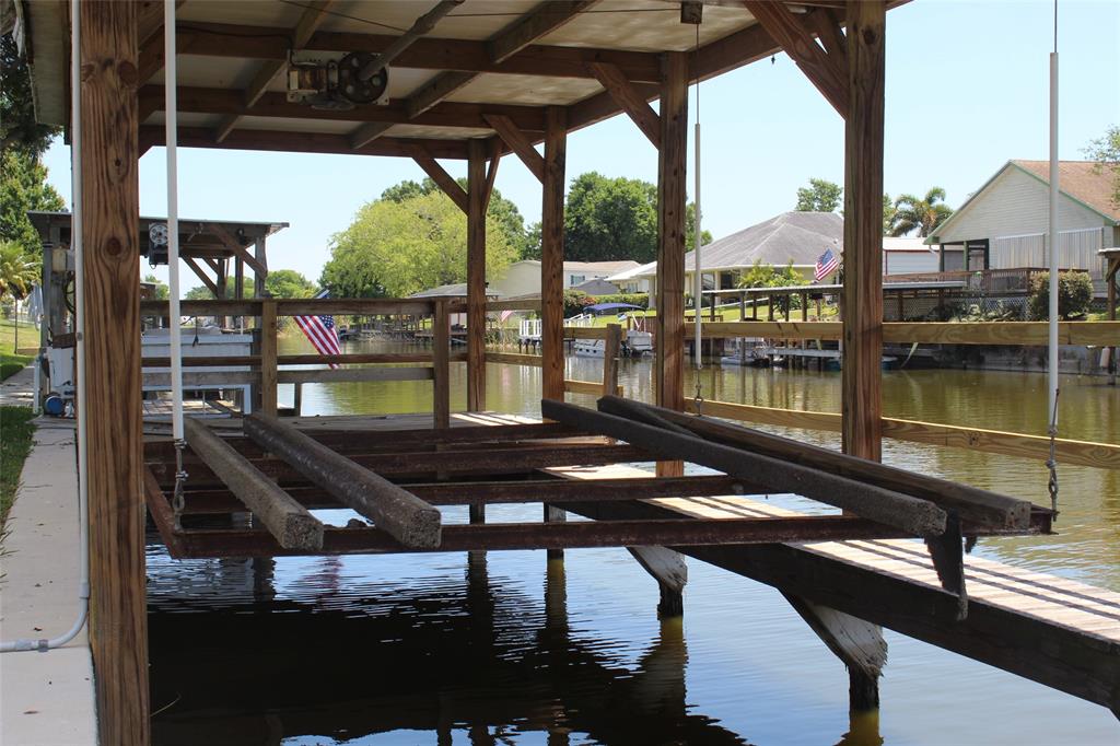 2422 Southeast 33rd Street Okeechobee, FL 34974 - Photo 3 of 32 a view of a chairs and table in the patio
