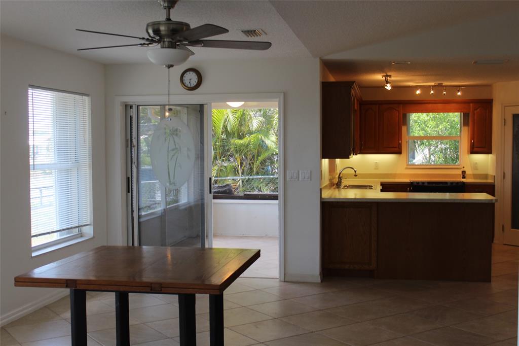 2422 Southeast 33rd Street Okeechobee, FL 34974 - Photo 8 of 32 a dining room with furniture and window