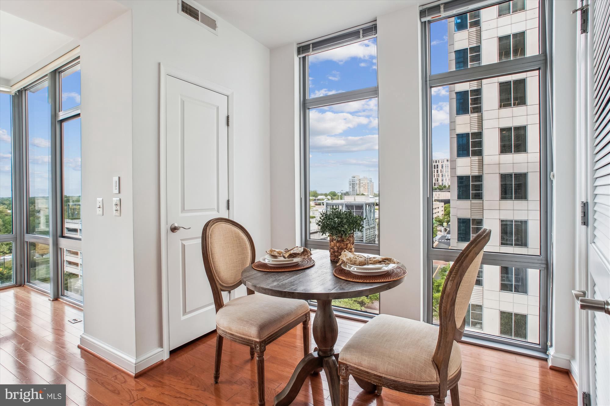 11990 Market Street, Unit 805 Reston, VA 20190 - Photo 15 of 53 a view of a workspace with furniture and a window