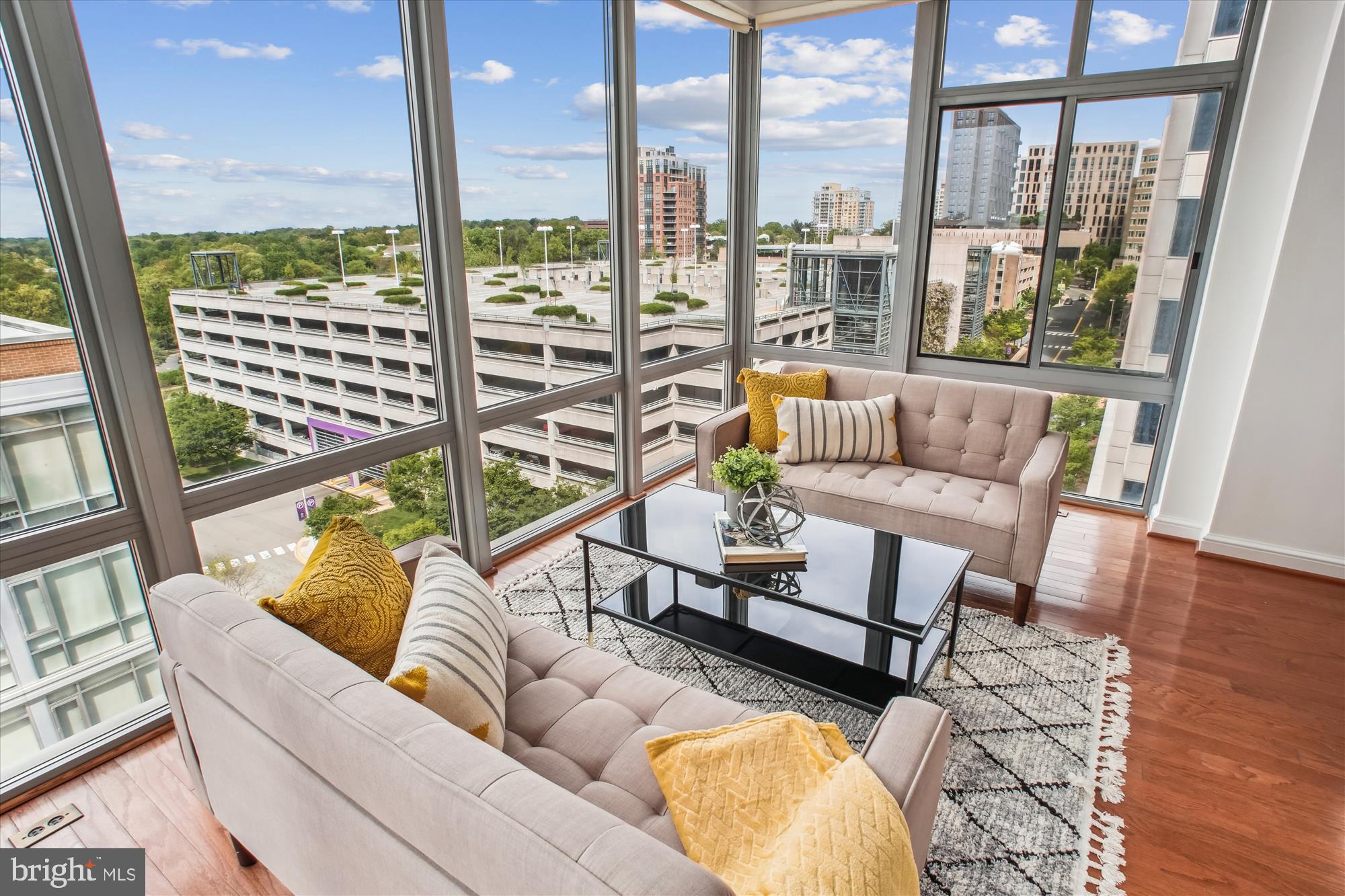 11990 Market Street, Unit 805 Reston, VA 20190 - Photo 17 of 53 a living room with furniture and a large window