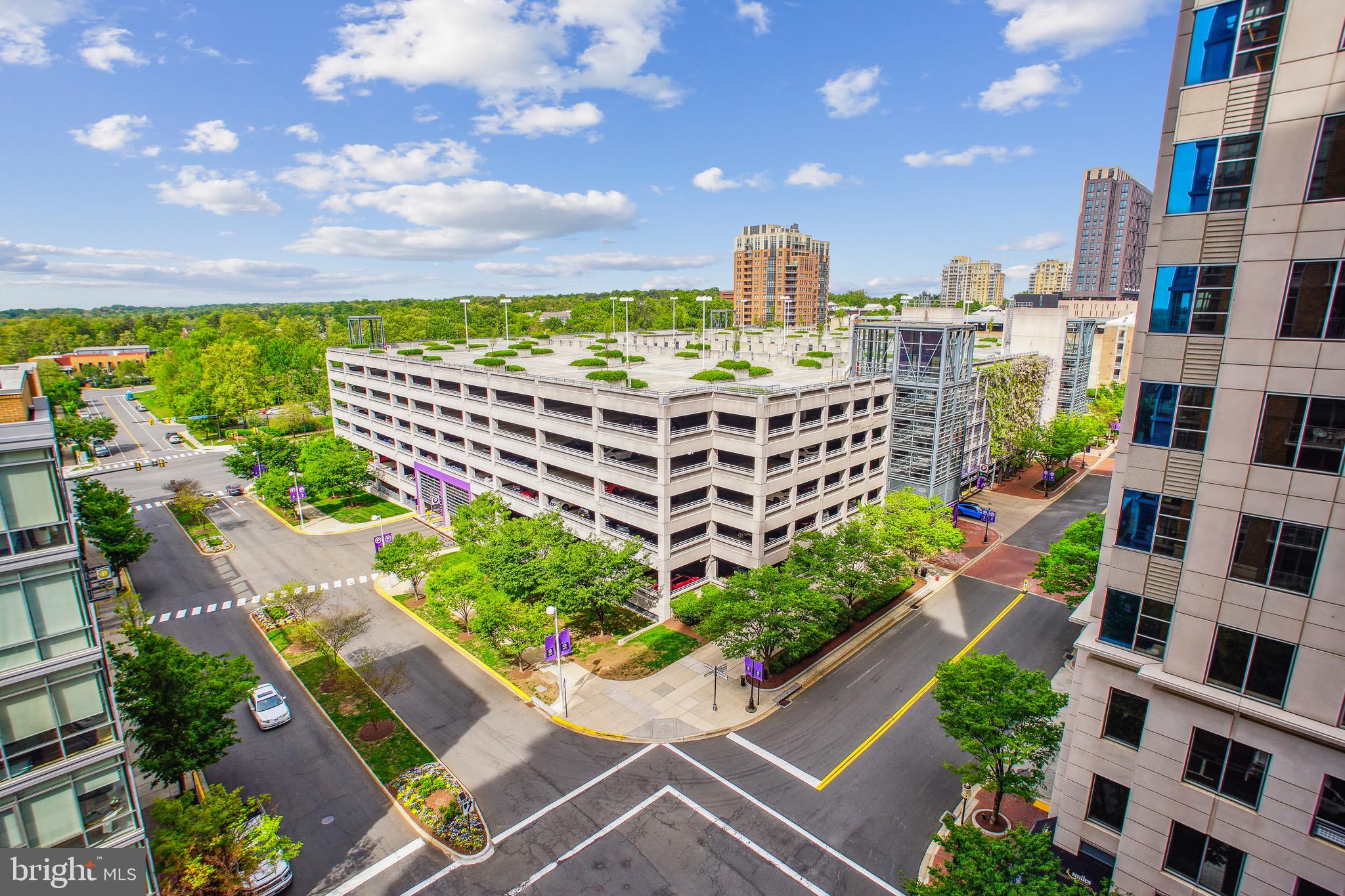 11990 Market Street, Unit 805 Reston, VA 20190 - Photo 3 of 53 a view of a city with tall buildings