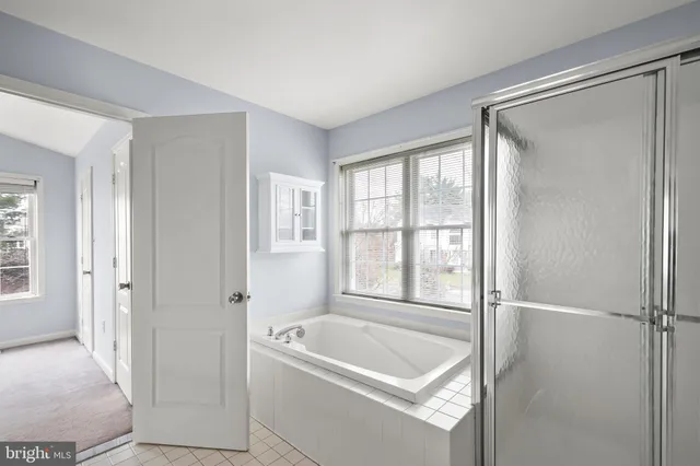 a balcony with wooden floor and outdoor space