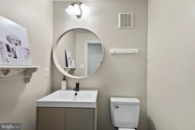 a view of a swimming pool with an outdoor seating