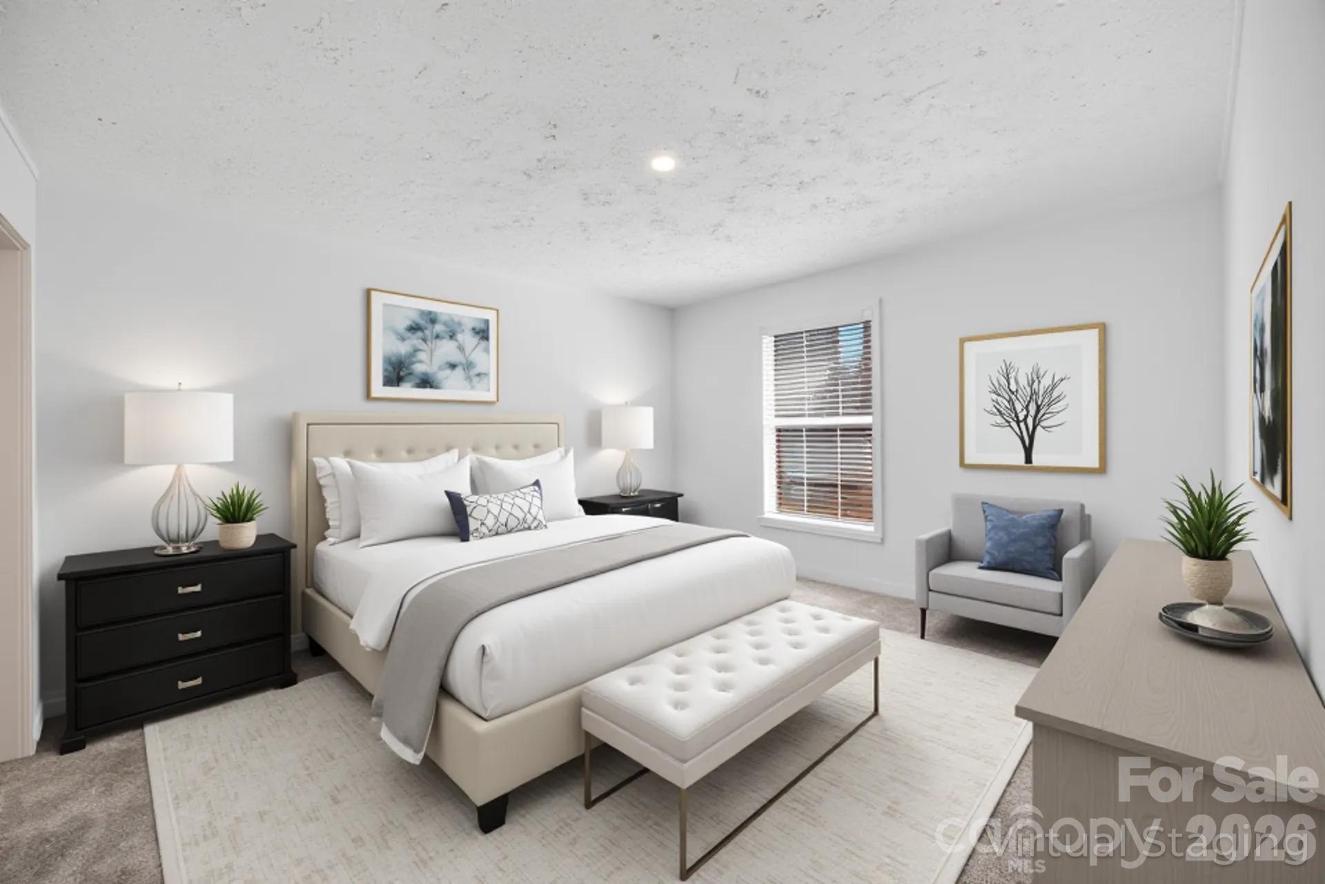 1395 Safrit Road Salisbury, NC 28146 - Photo 23 of 37 a bedroom with a bed a couch and potted plant