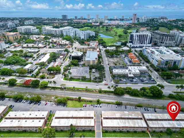 a kitchen with stainless steel appliances a sink and a stove