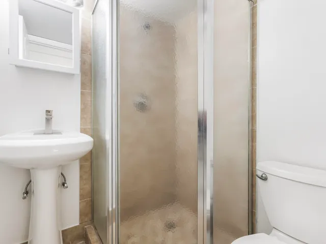 a bathroom with a sink and toilet