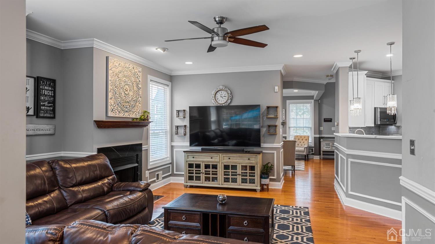 68 Timber Ridge Road North Brunswick, NJ 08902 - Photo 11 of 37 a living room with furniture and a flat screen tv