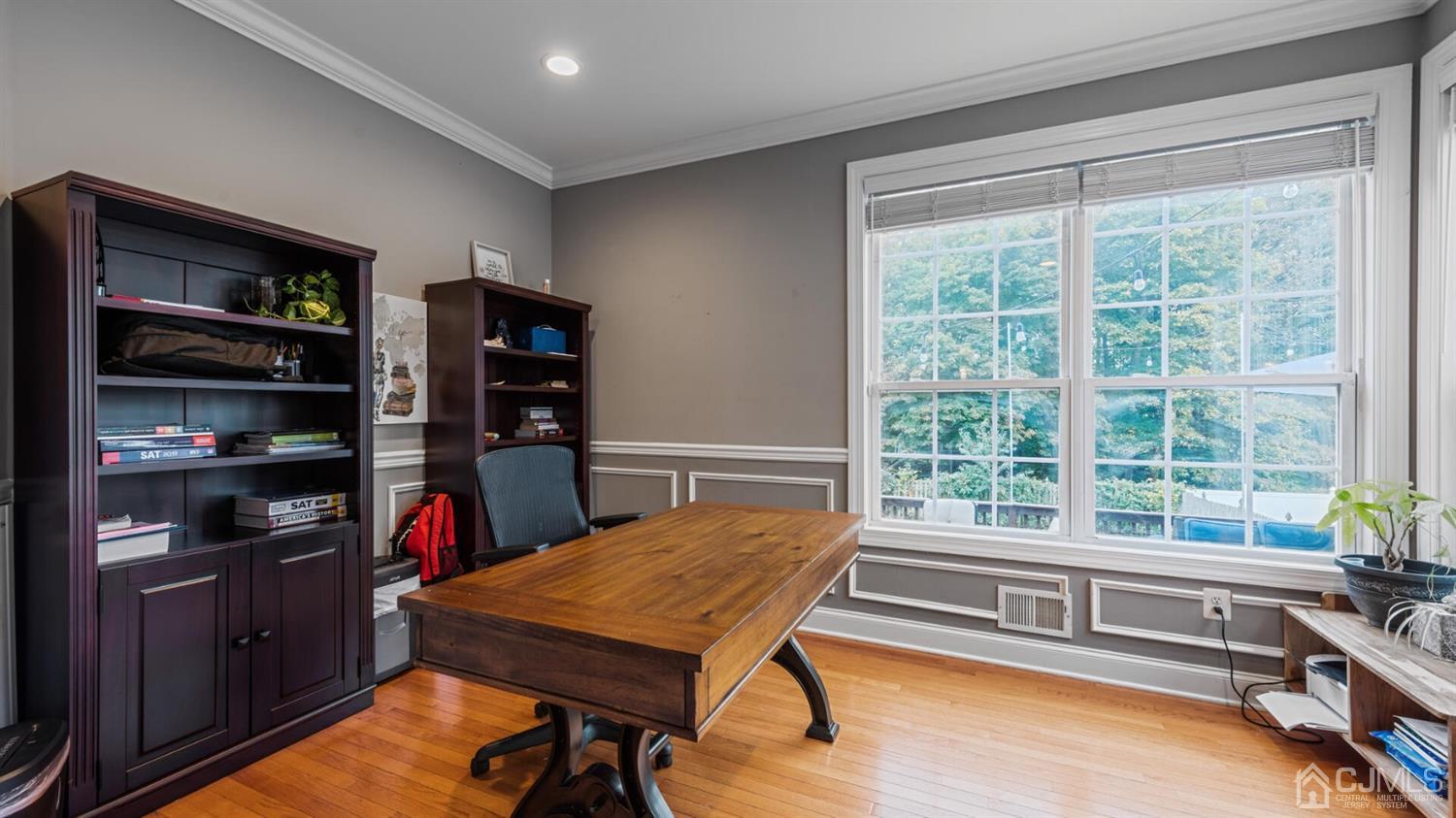 68 Timber Ridge Road North Brunswick, NJ 08902 - Photo 13 of 37 a view of a workspace with furniture and a window