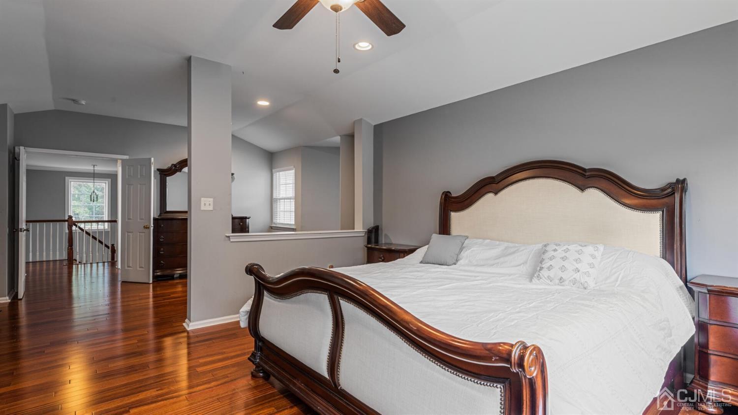 68 Timber Ridge Road North Brunswick, NJ 08902 - Photo 16 of 37 a bedroom with a bed and a potted plant on dresser