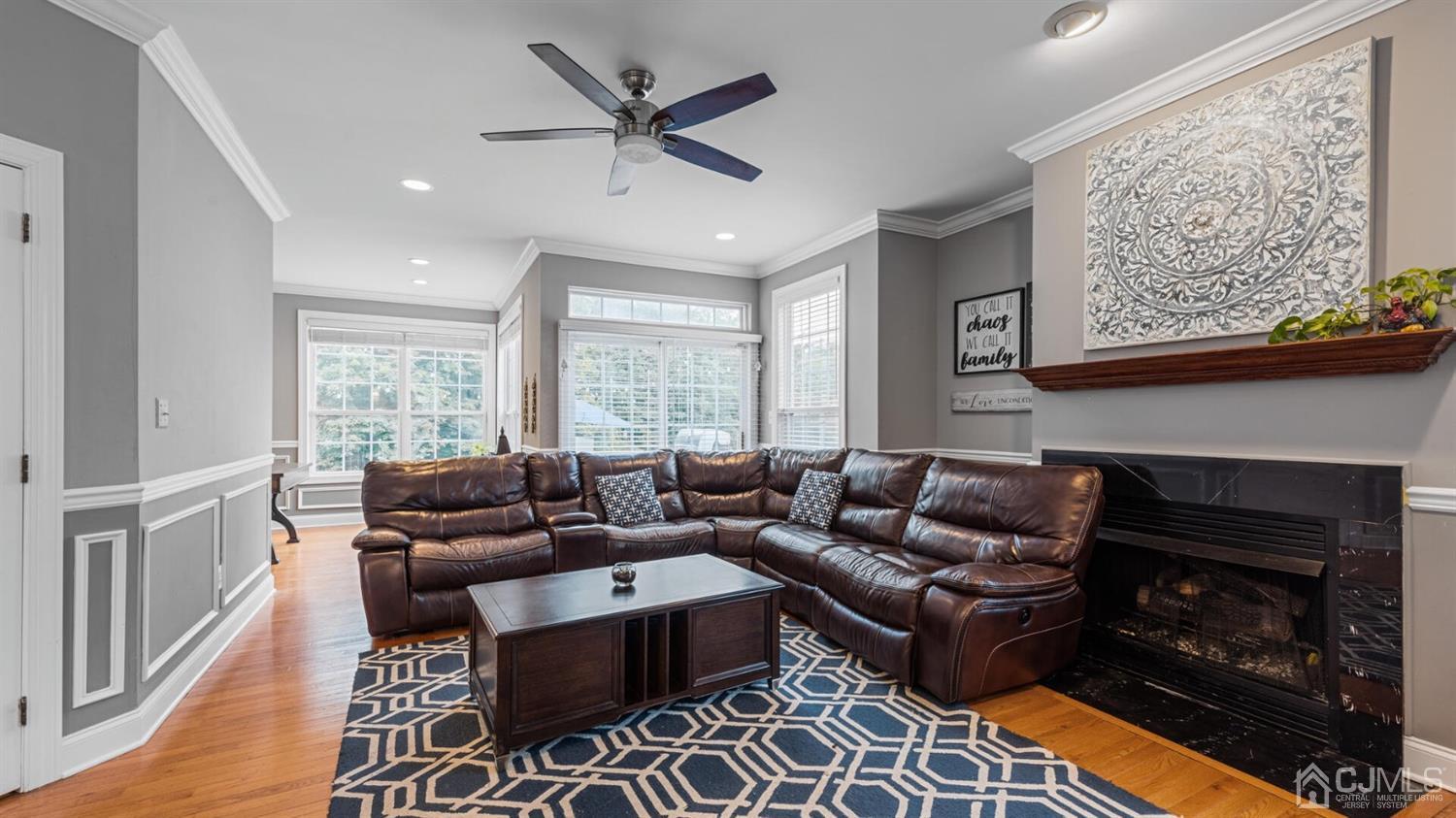68 Timber Ridge Road North Brunswick, NJ 08902 - Photo 10 of 37 a living room with furniture and a fireplace