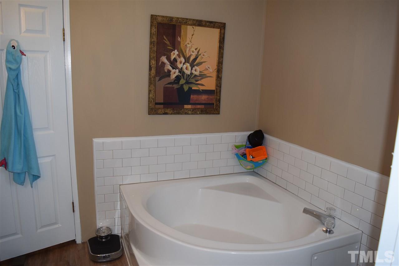 801 Sunshine Road Kenly, NC 27542 - Photo 12 of 24 You have to see the space in this bathroom!