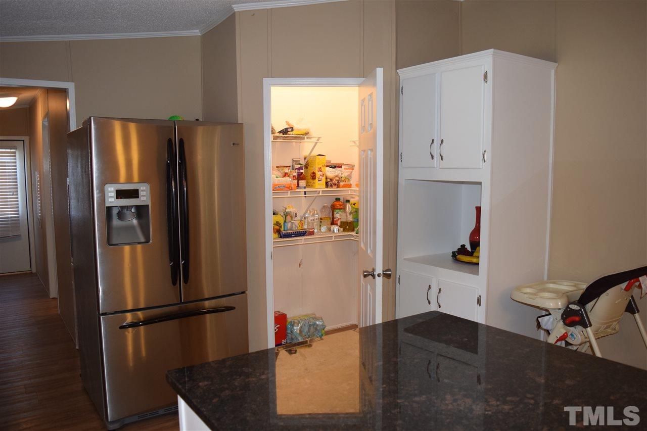 801 Sunshine Road Kenly, NC 27542 - Photo 8 of 24 Lots to see in this kitchen.