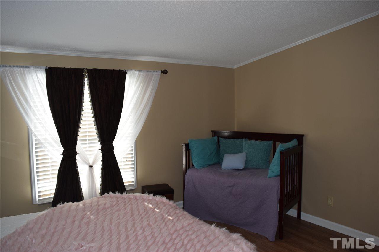 801 Sunshine Road Kenly, NC 27542 - Photo 10 of 24 Lots of room in this bedroom.