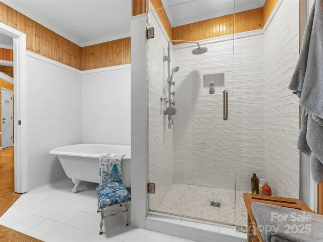 a bathroom with a shower and a toilet