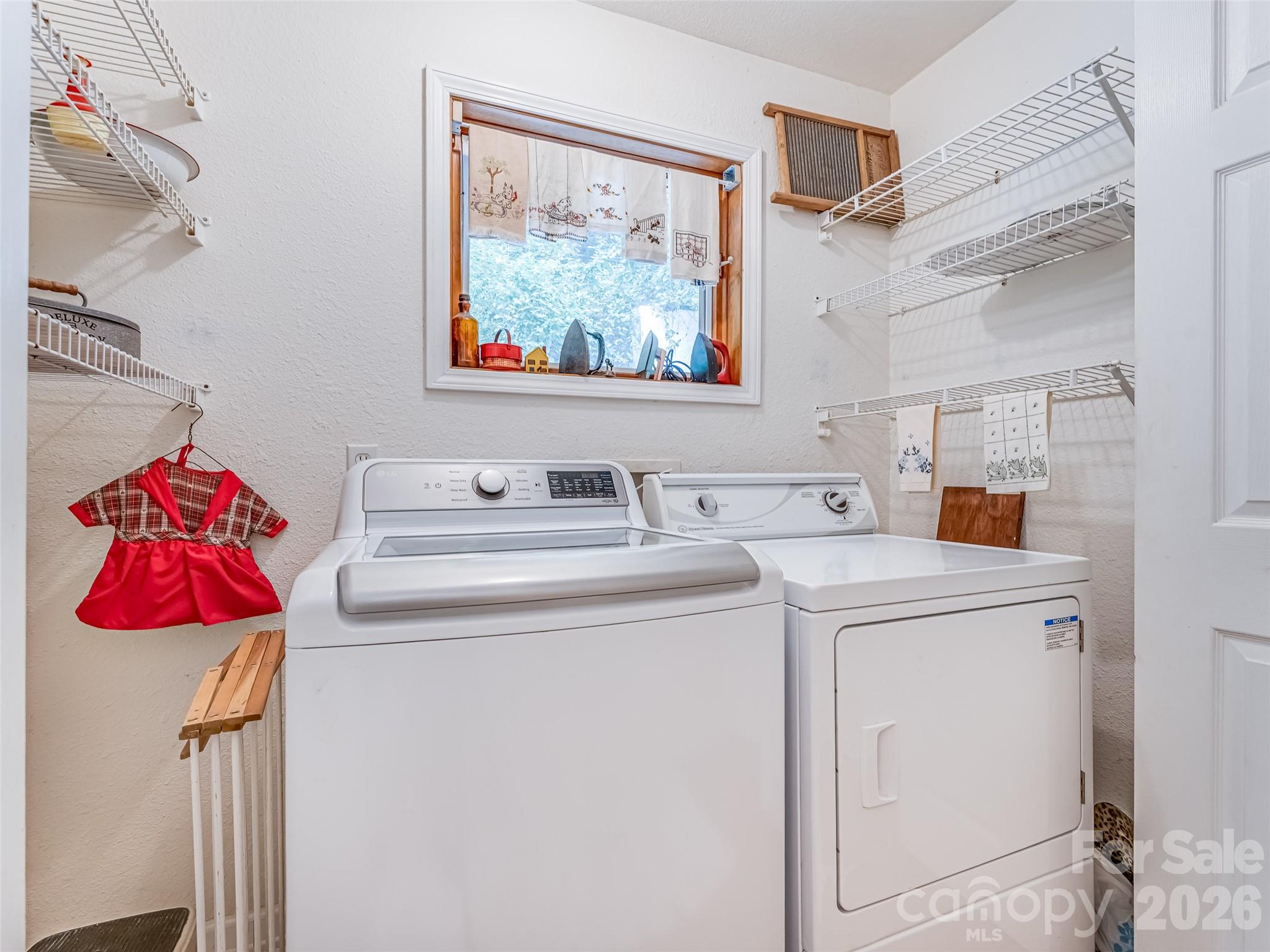 645 West Fork Creek Road Saluda, NC 28773 - Photo 23 of 44 a utility room with dryer and washer