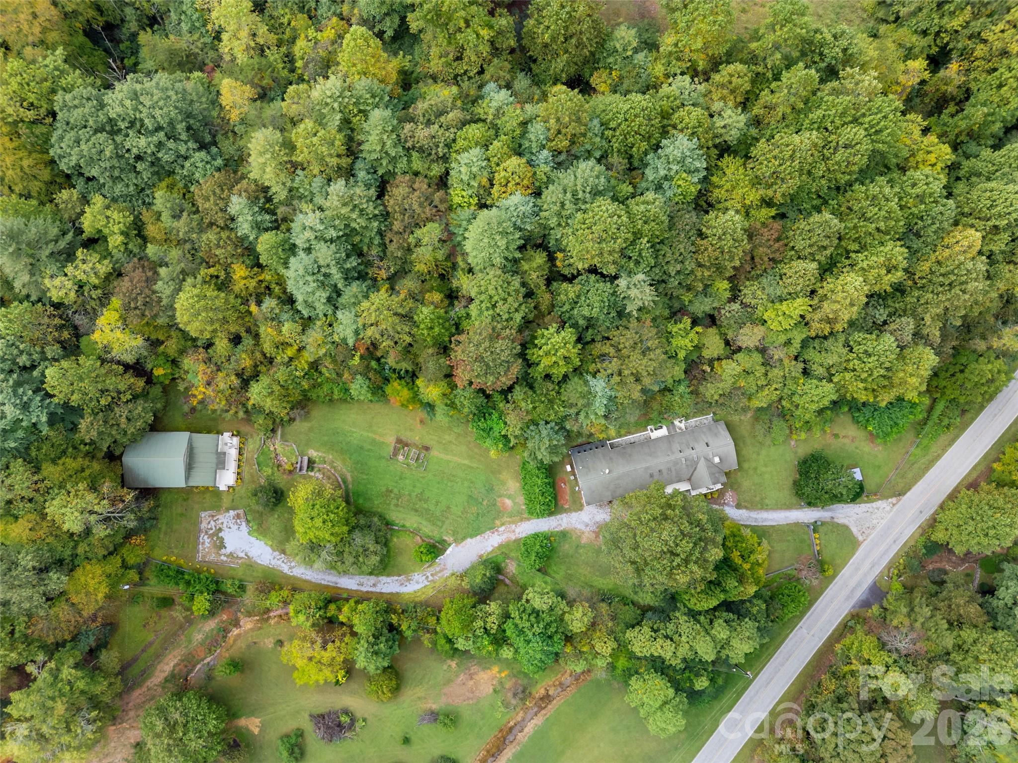 645 West Fork Creek Road Saluda, NC 28773 - Photo 41 of 44 a view of a garden from a balcony