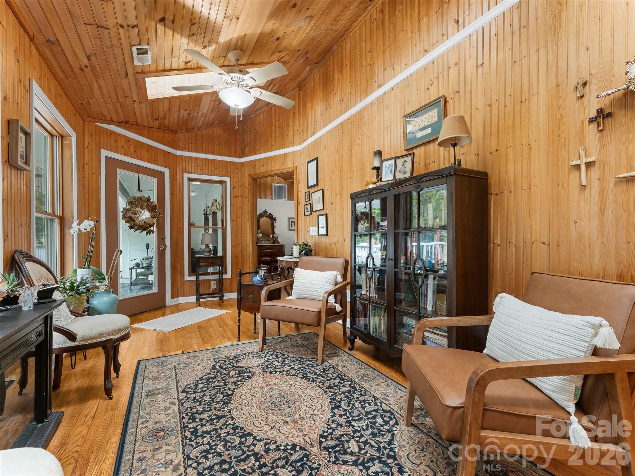 645 West Fork Creek Road Saluda, NC 28773 - Photo 7 of 44 a living room with furniture a chandelier and a table