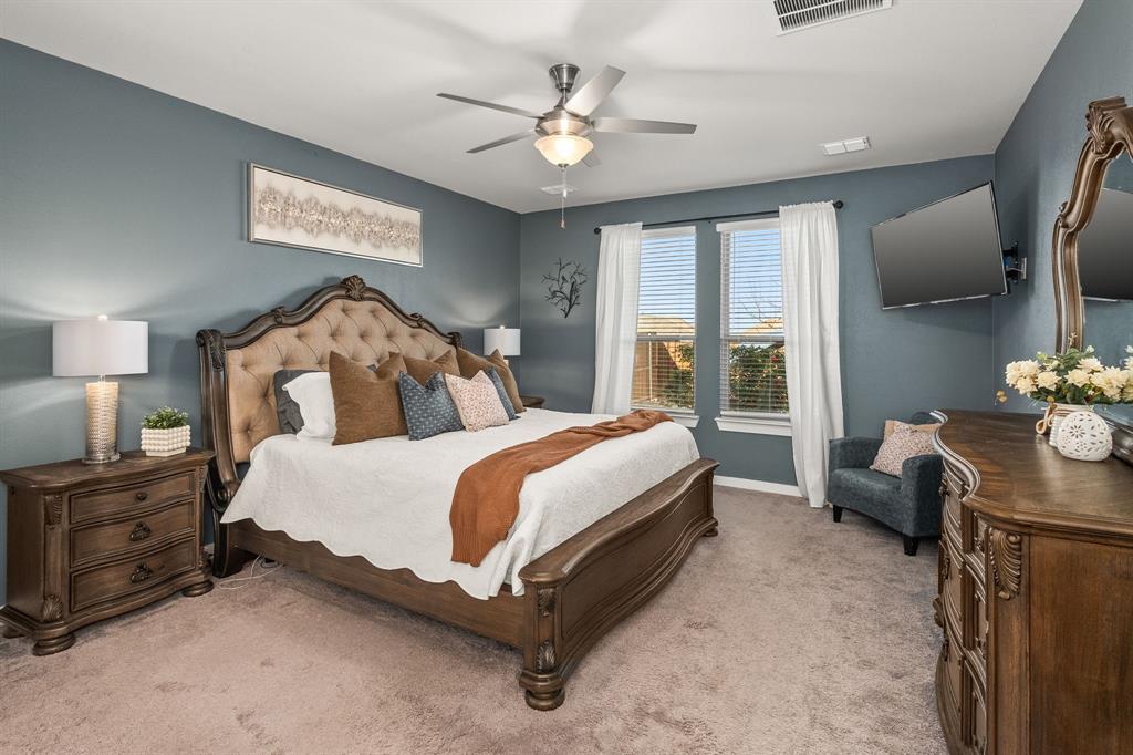 4017 Mapleleaf Pass Melissa, TX 75454 - Photo 12 of 32 a bedroom with a bed dresser and a window